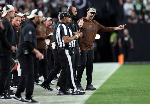 Aaron Rodgers and Robert Saleh during New York Jets v Las Vegas Raiders