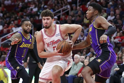 The Rockets beat the Lakers in front of Hakeem Olajuwon and Clyde Drexler.