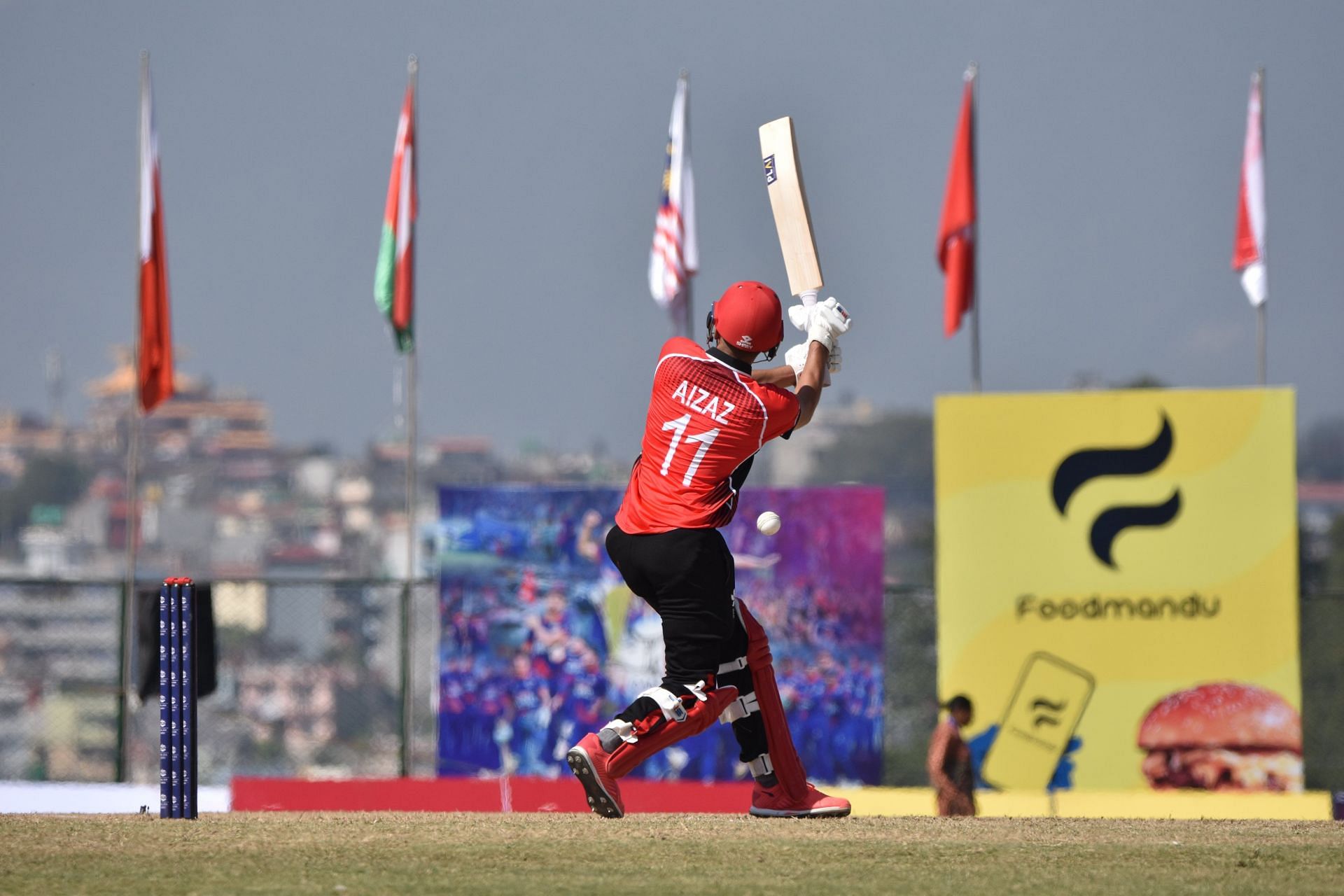 Aizaz Khan in action for Malaysia against Bahrain (Image Credits: Twitter/Cricket Hong Kong, China)