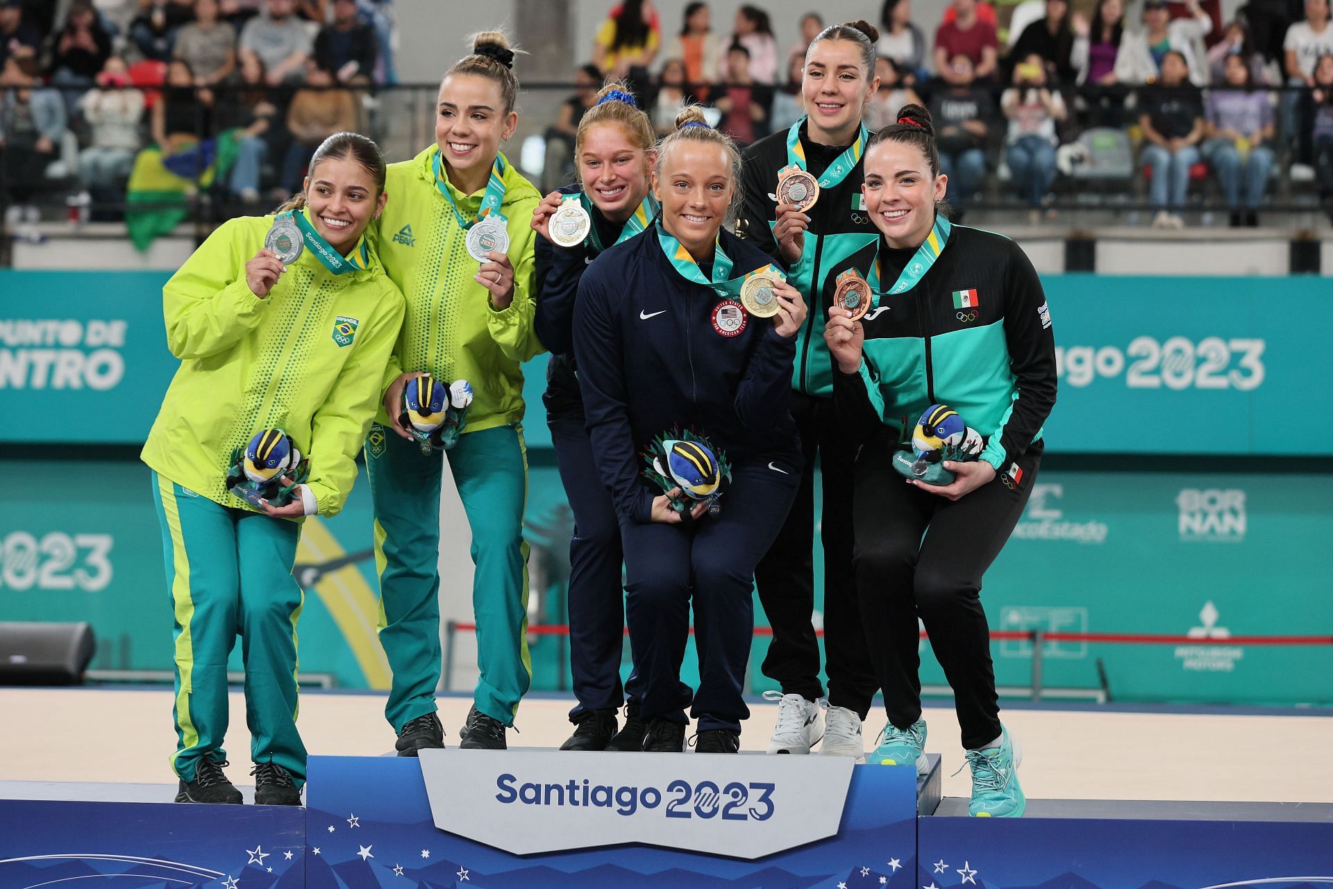 Silver medalistsTeam Brazil, Gold medalistsTeam United States, and Bronze medalists Team Mexico pose on the podium for Gymnastics - Women&#039;s Synchronized Trampoline at the 2023 Pan Am Games in Santiago, Chile