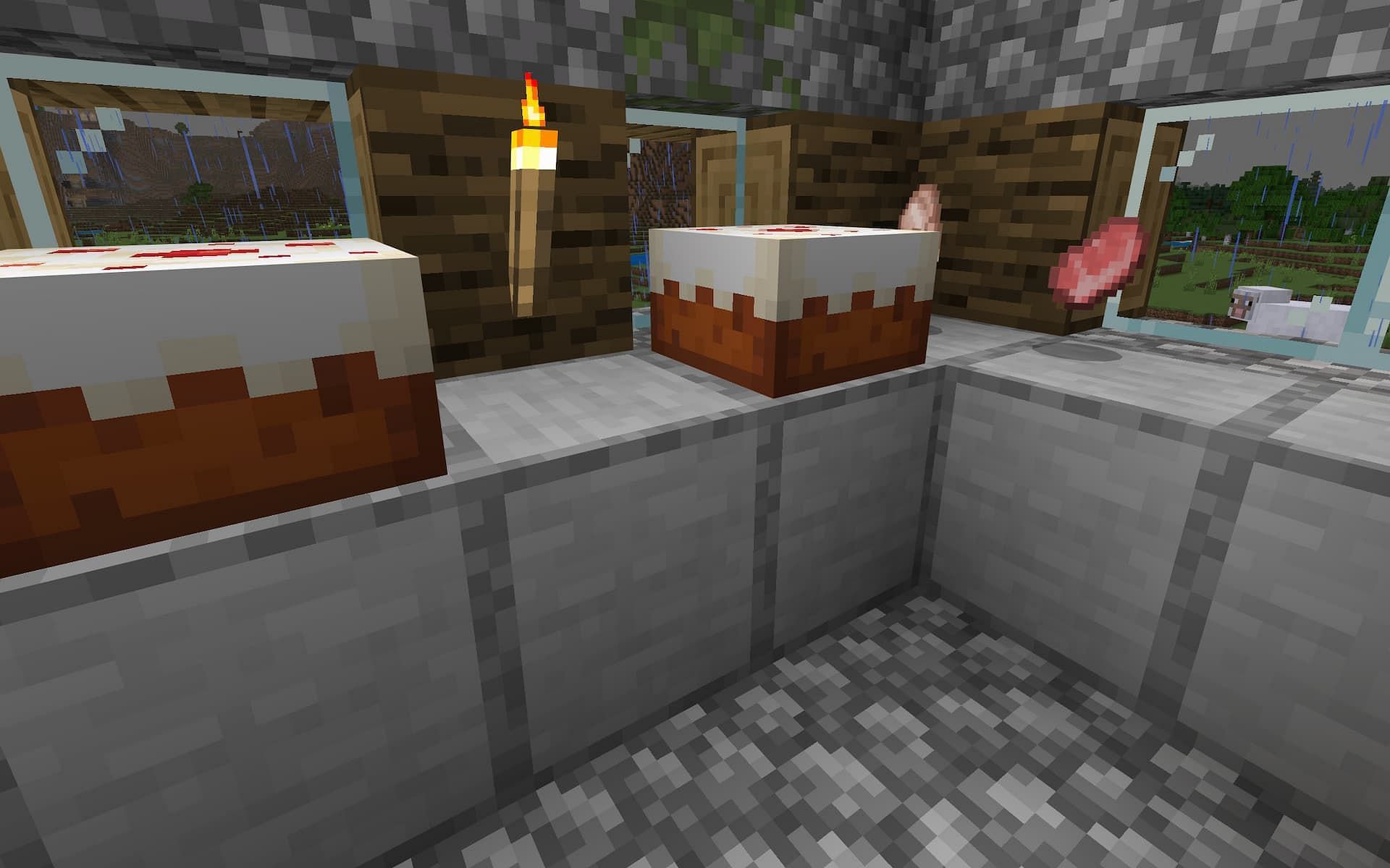 Cakes and meats line a countertop in a Minecraft house.