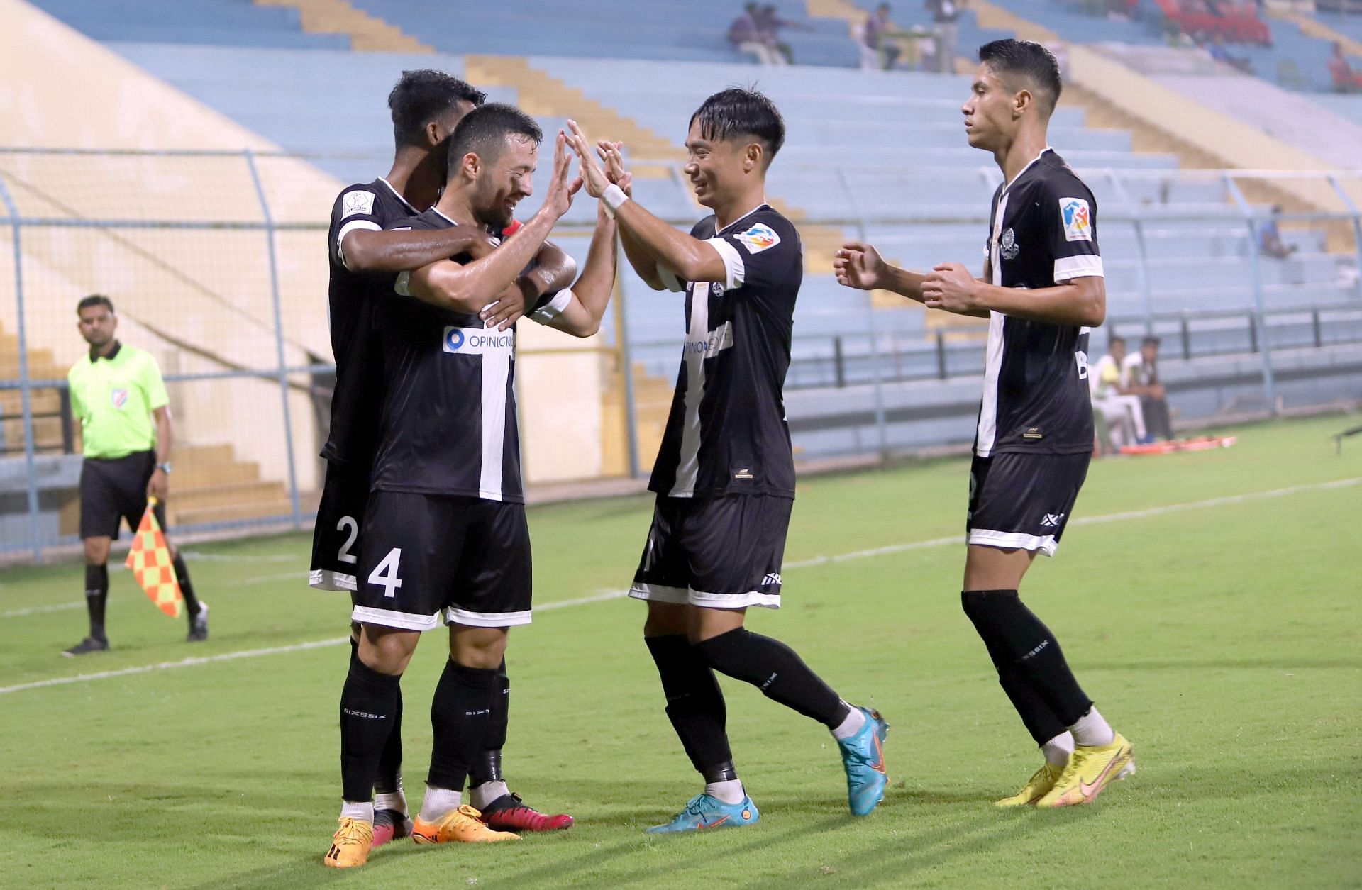 Mohammedan SC Players celebrating after scoring a goal against TRAU