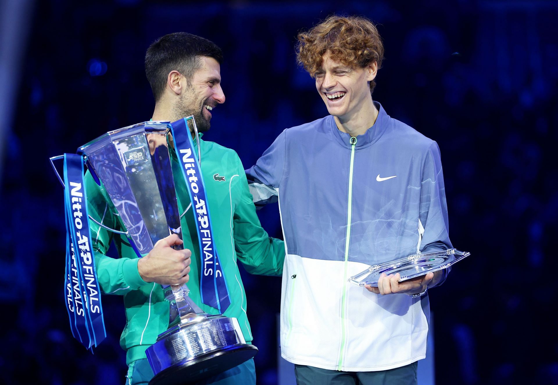 Novak Djokovic and Jannik Sinner pictured with their 2023 ATP Finals trophies