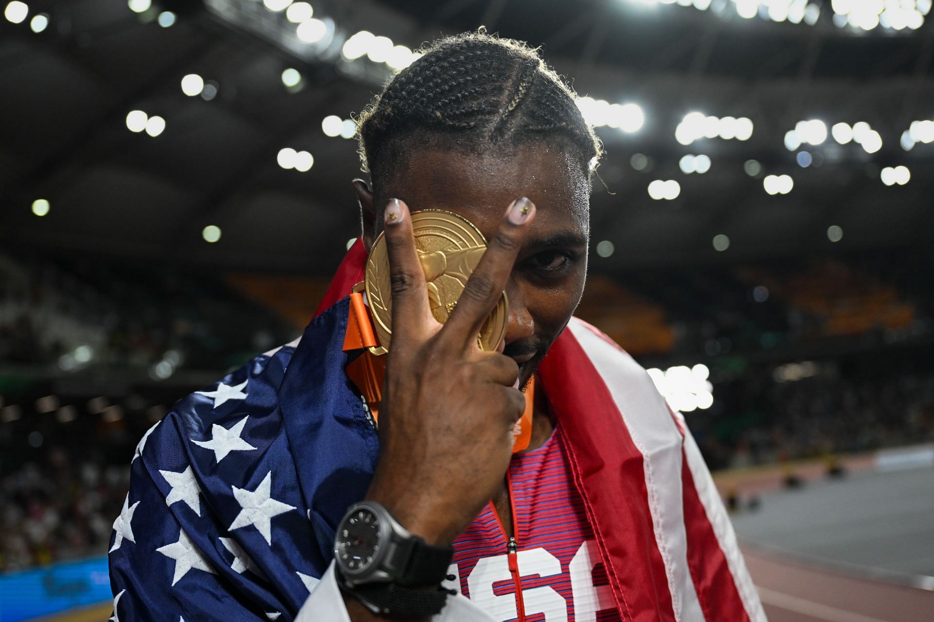 Noah Lyles of Team United States celebrates with the gold medal after winning the Men's 200m Final during the World Athletics Championships 2023 in Budapest, Hungary. 