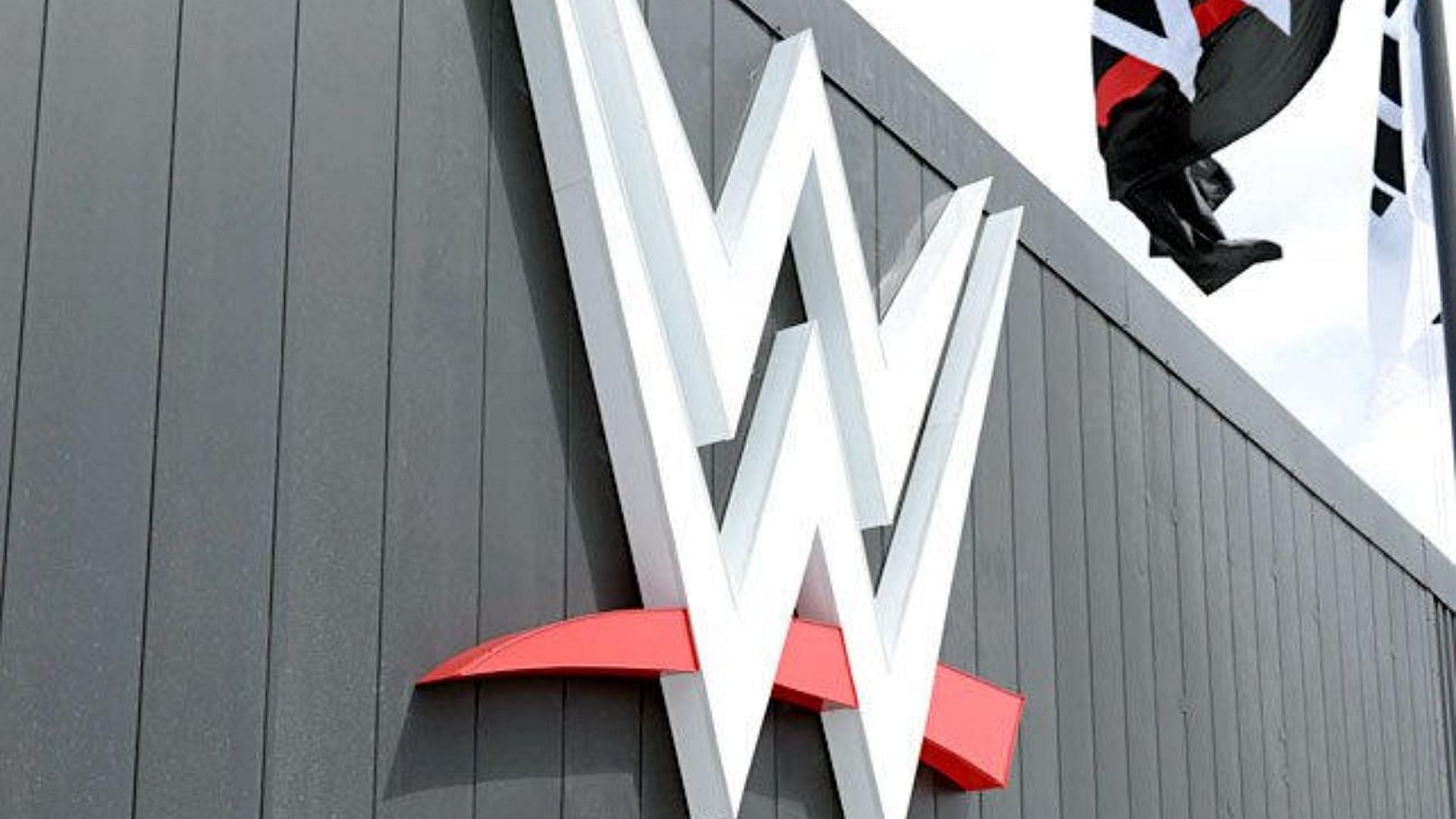 The giant WWE logo on the company