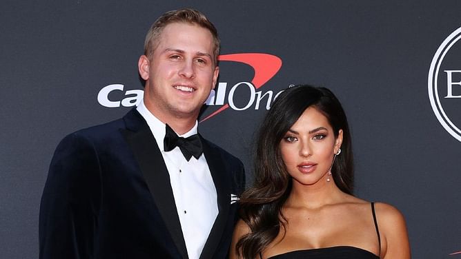 Christen Harper models $1225 custom jacket for Jared Goff's Thanksgiving clash vs Packers