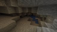 Caves have no limits and can be explored freely from an island in Minecraft (Image via Mojang)