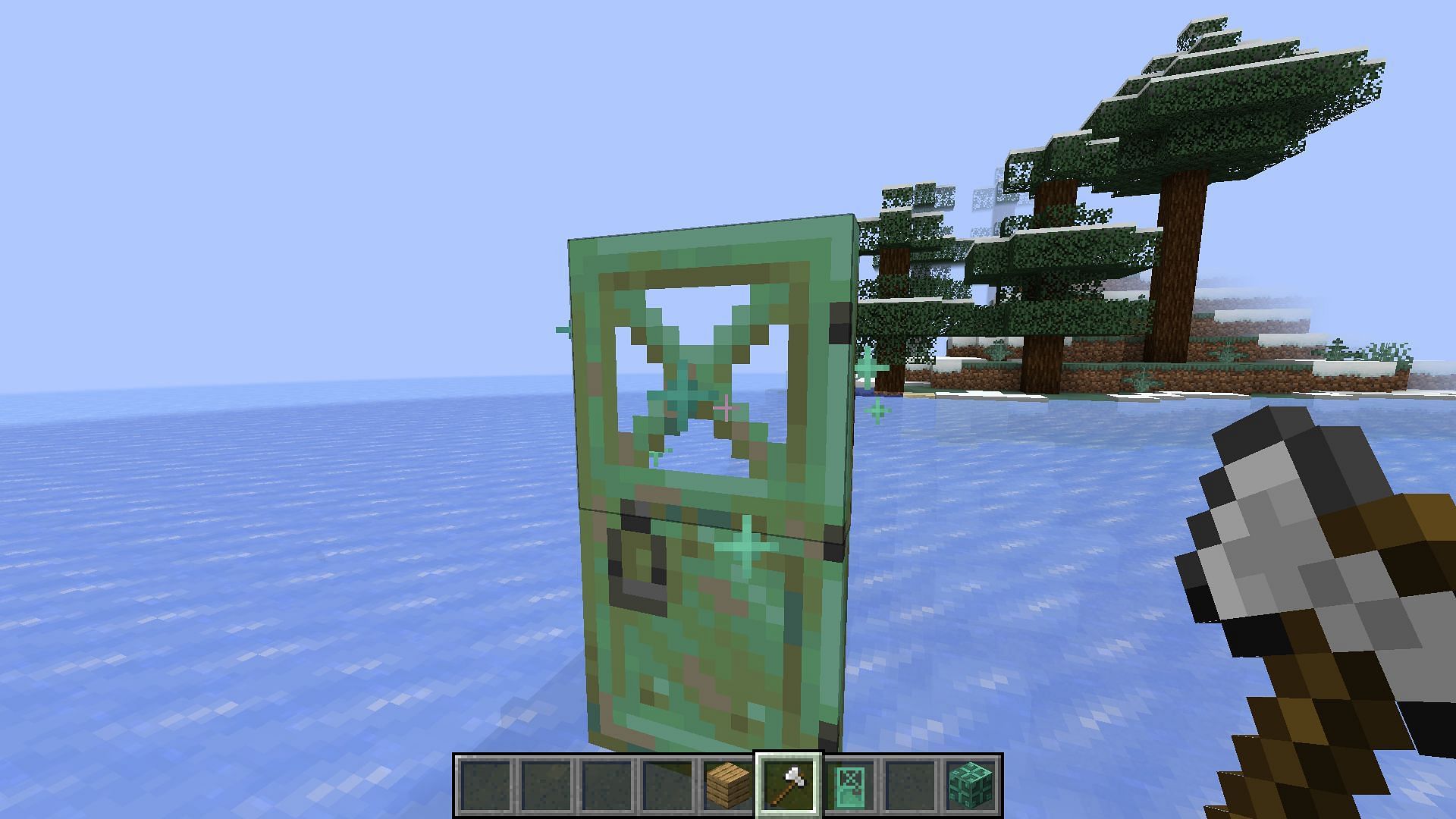 The oxidation can be removed from copper doors by using an axe while crouching down in Minecraft (Image via Mojang)