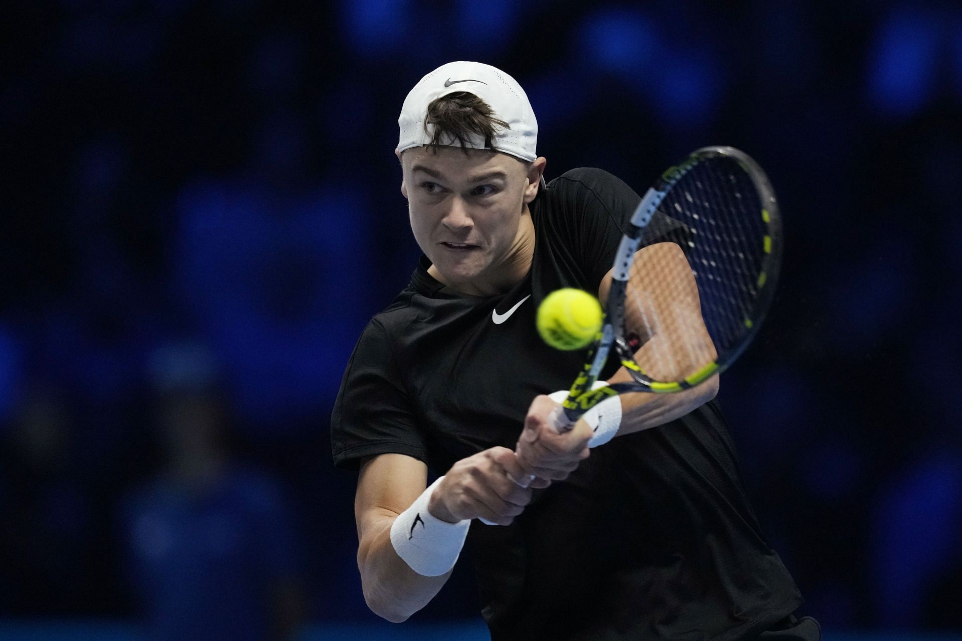 Holger Rune in action at the ATP Finals