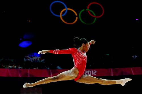 Gabrielle Douglas competes on the balance beam in the Artistic Gymnastics Women's Team final at the 2012 Olympic Games in London, England.