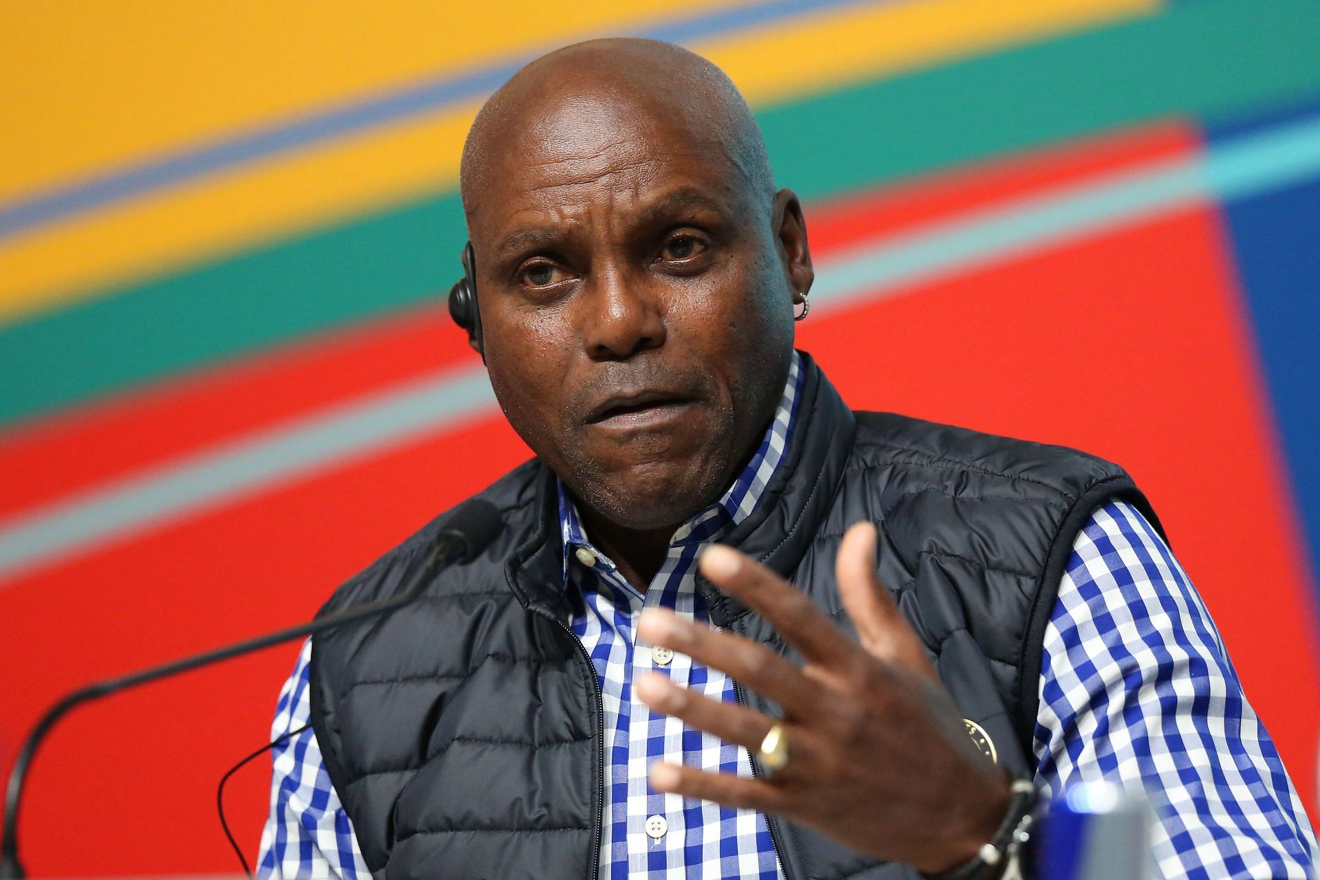 Carl Lewis talks during a press conference at the 2023 Pan Am Games in Santiago, Chile.