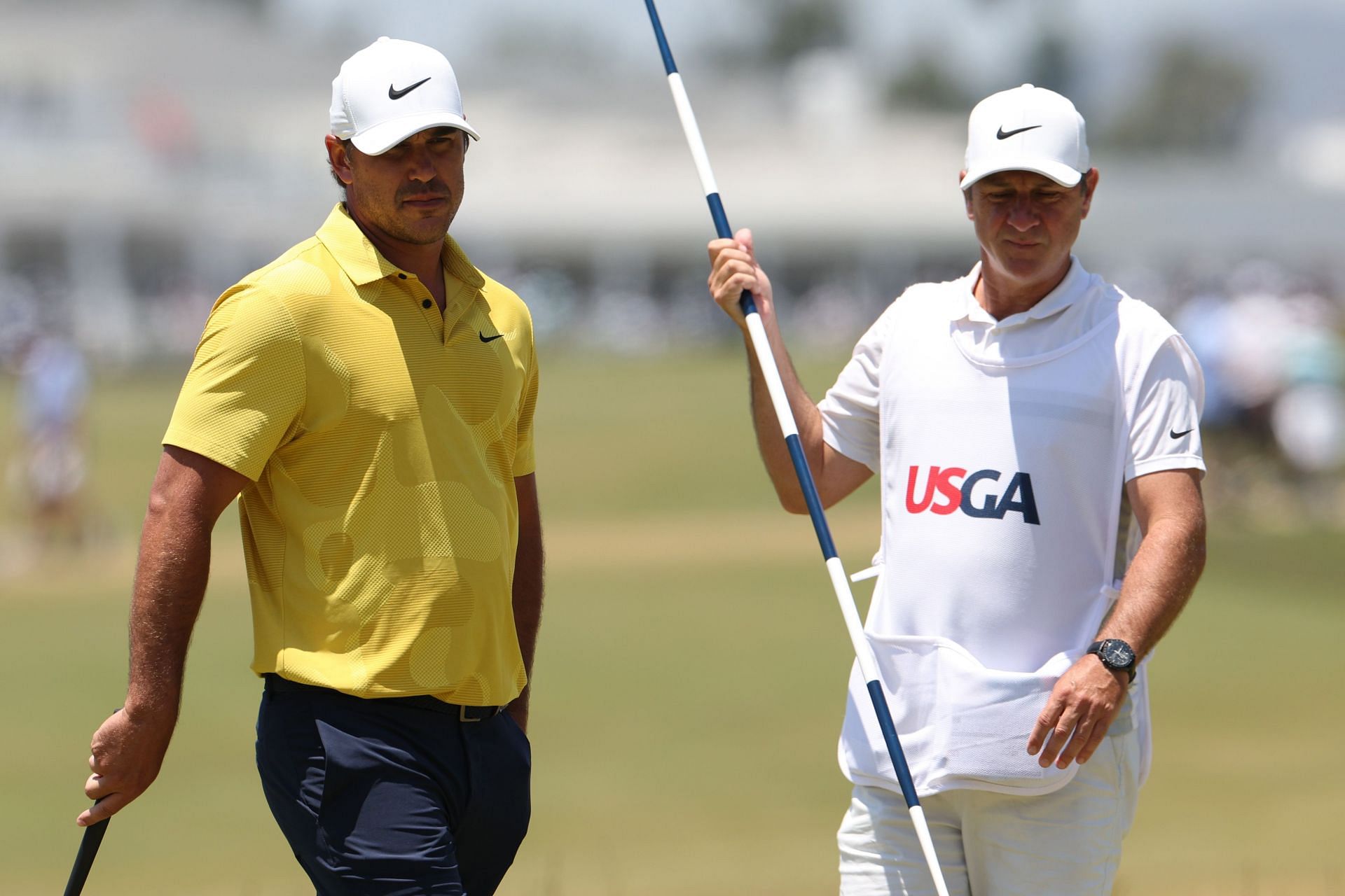 Brooks Koepka and Ricky Elliott at the 123rd U.S. Open Championship - Round Three (Image via Getty)