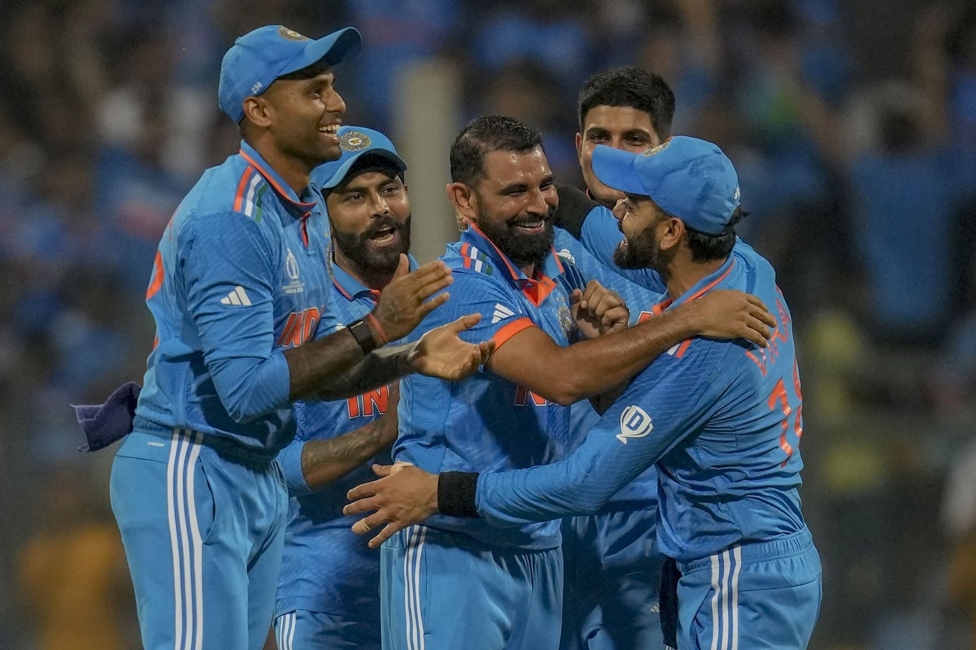 Mohammed Shami celebrating with his teammates [Getty Images]
