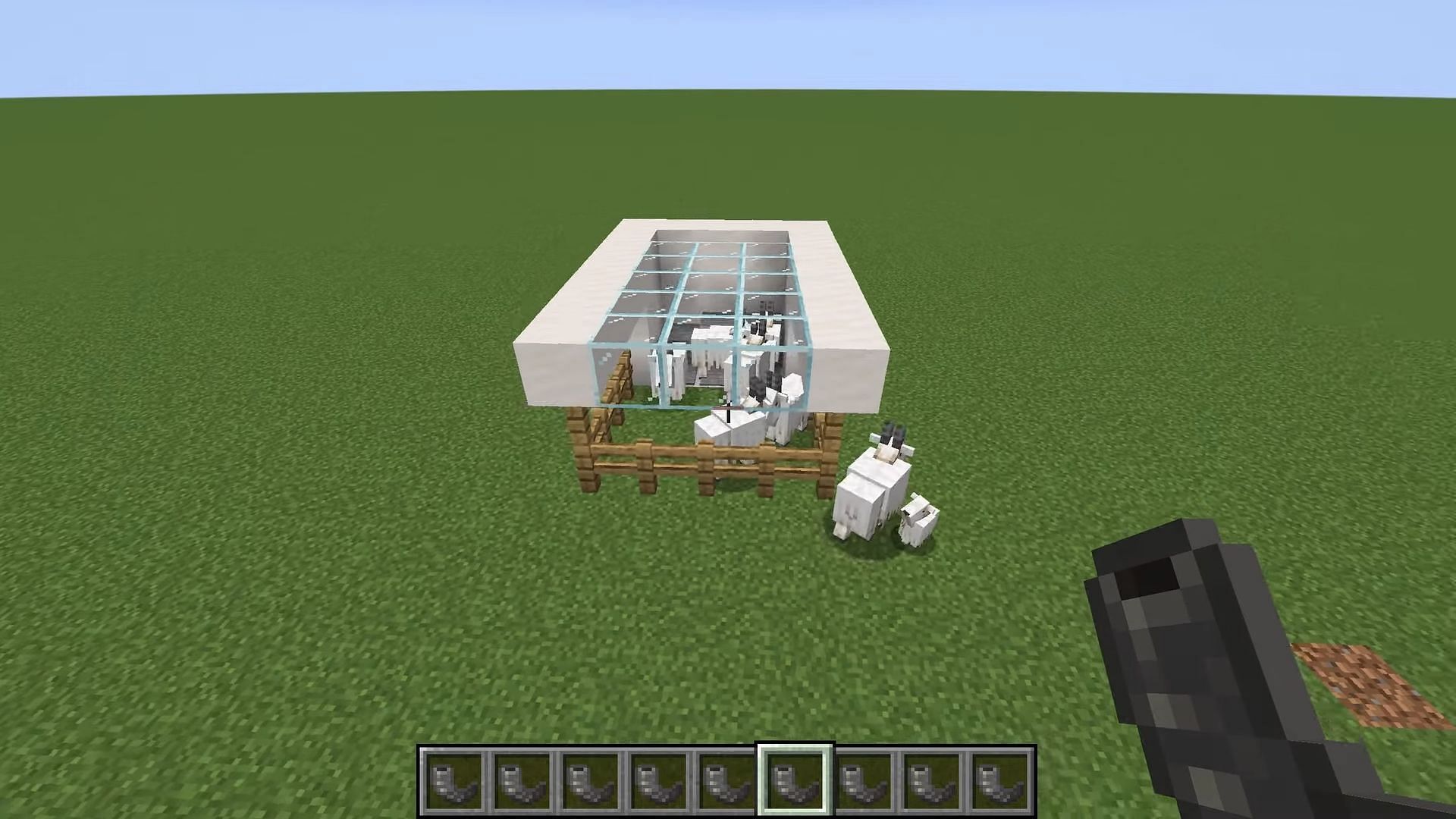 Goat horns can be farmed in Minecraft by using goats to ram solid blocks (Image via RetroSpekt/YouTube)