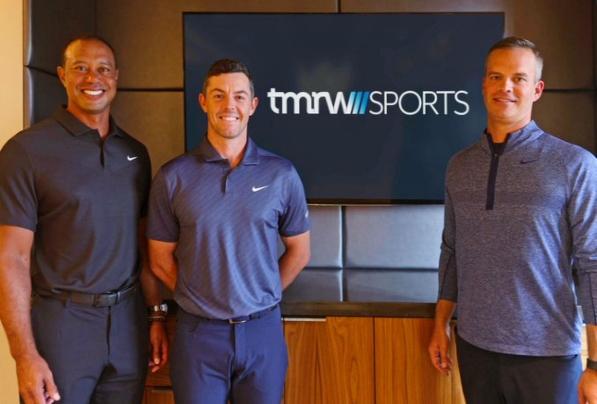 Tiger Woods, Rory McIlroy and Mike McCarley, founders of TMRW Sports (Image via X @JeffEisenband).