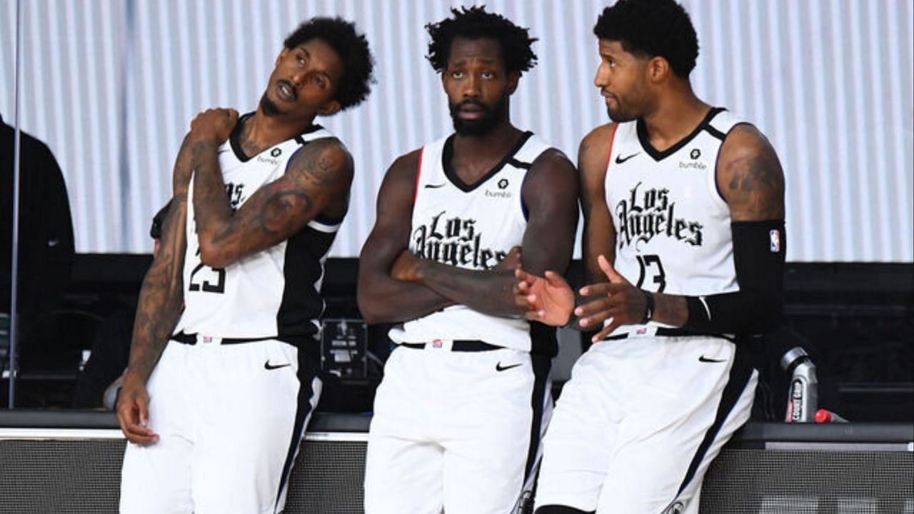 Lou Williams, Patrick Beverley and Paul George during Orlando Bubble