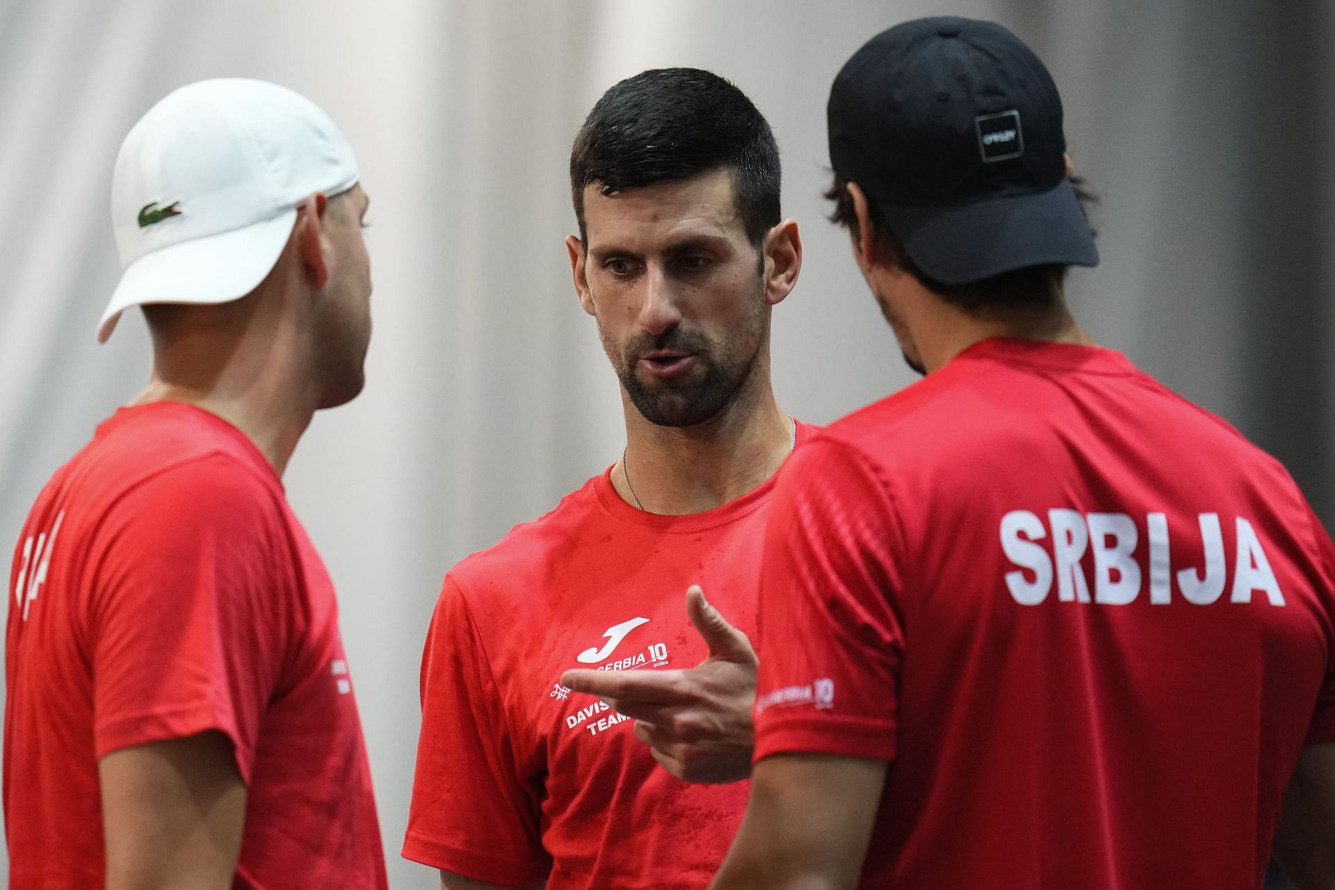 Novak Djokovic (C) at the 2023 Davis Cup.