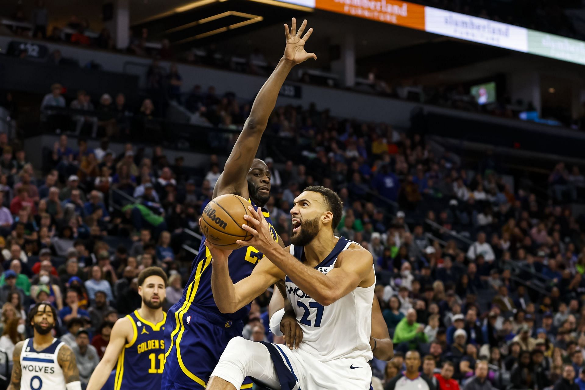 Draymond Green of the Golden State Warriors and Rudy Gobert of the Minnesota Timberwolves