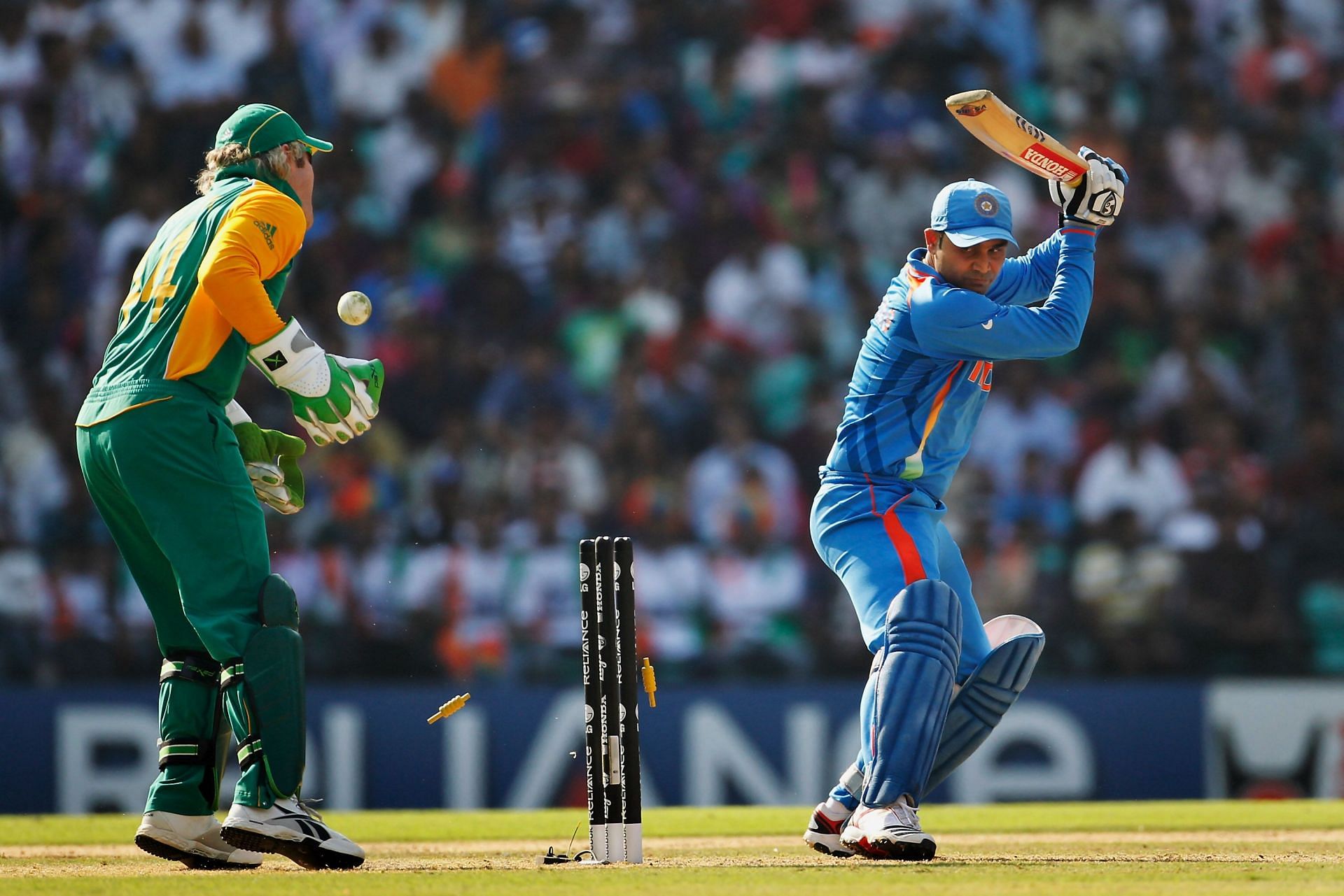 Virender Sehwag is bowled by Faf du Plessis. (Pic: Getty Images)