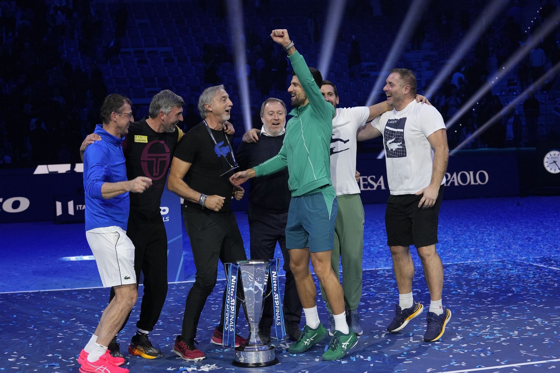 A victorious Djokovic along with his team in Turin