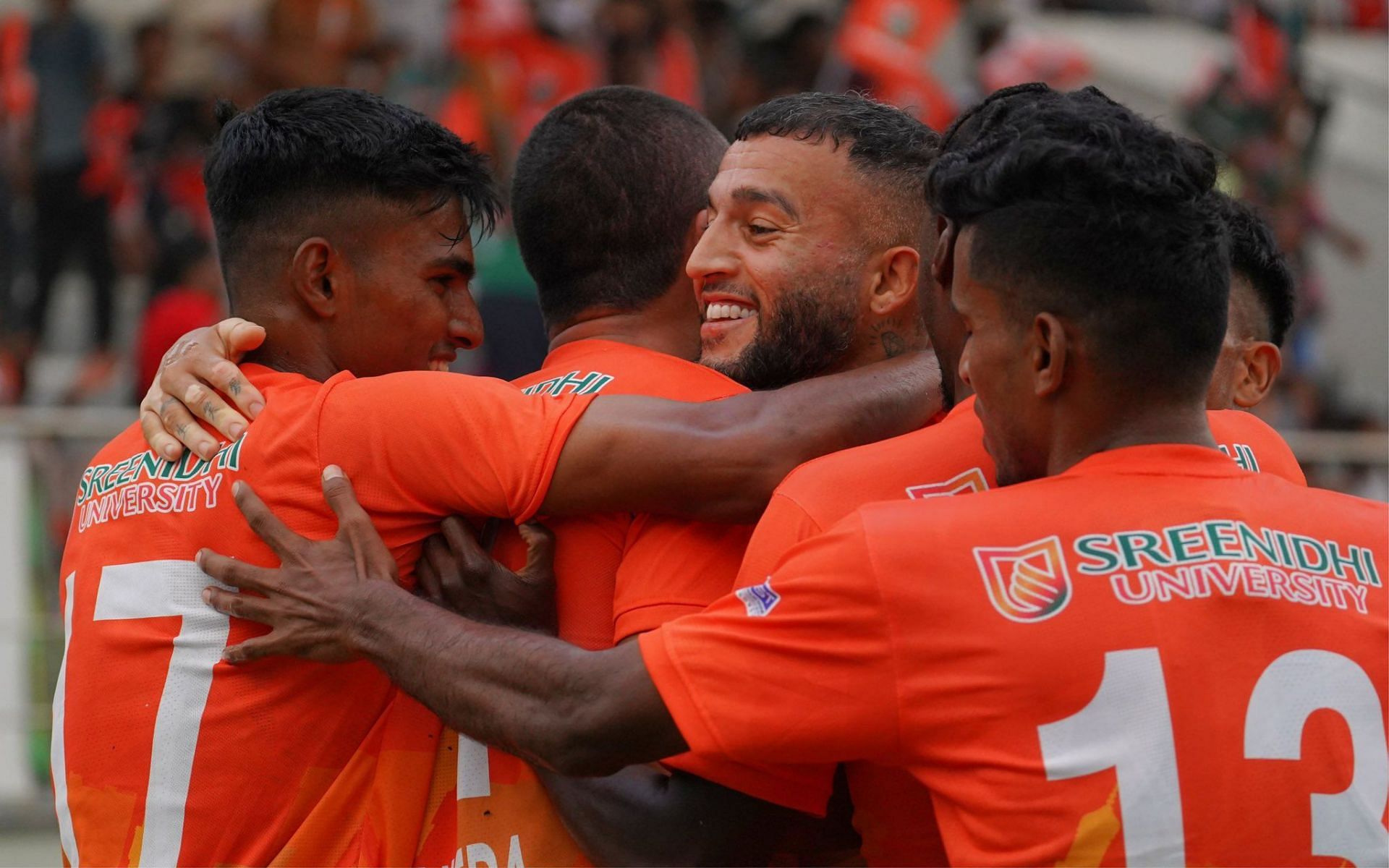 Sreenidhi Deccan FC players celerate a goal against NEROCA  (Image Credits: Twitter/I-League)