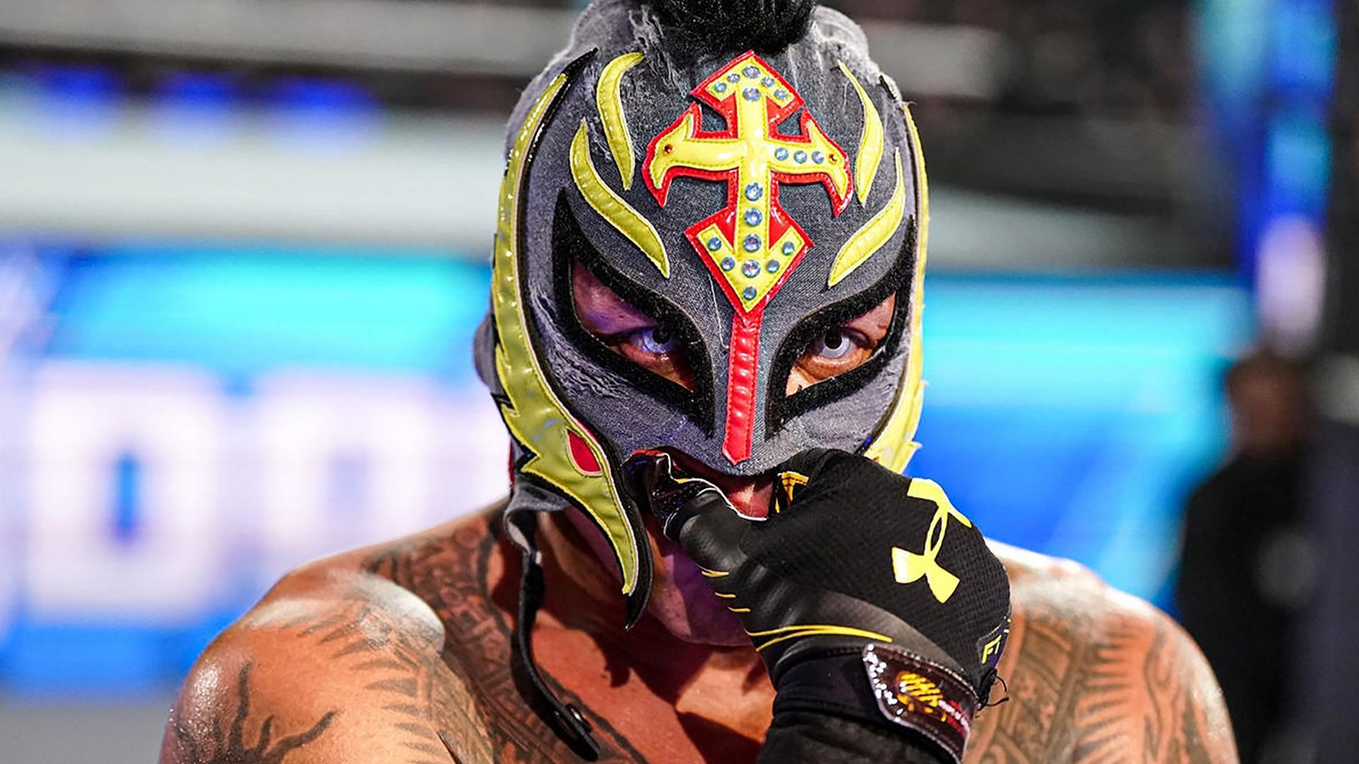 WWE Hall of Famer Rey Mysterio looks on from the stage