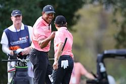 WATCH: Charlie Woods shoots an impressive shot on the first tee of Junior Golf championship as Tiger Woods continues to caddie for son
