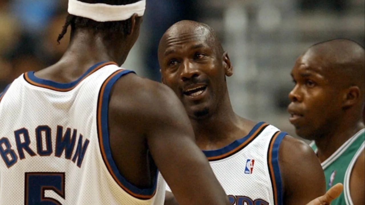 Michael Jordan taking to Kwame Brown during a game against the Boston Celtics 
