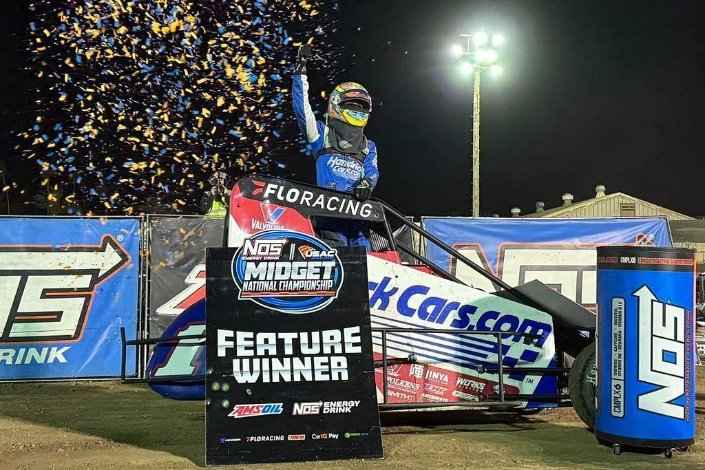 Kyle Larson celebrates after winning the USAC National Midgets Turkey Night Grand Prix at Ventura Raceway 