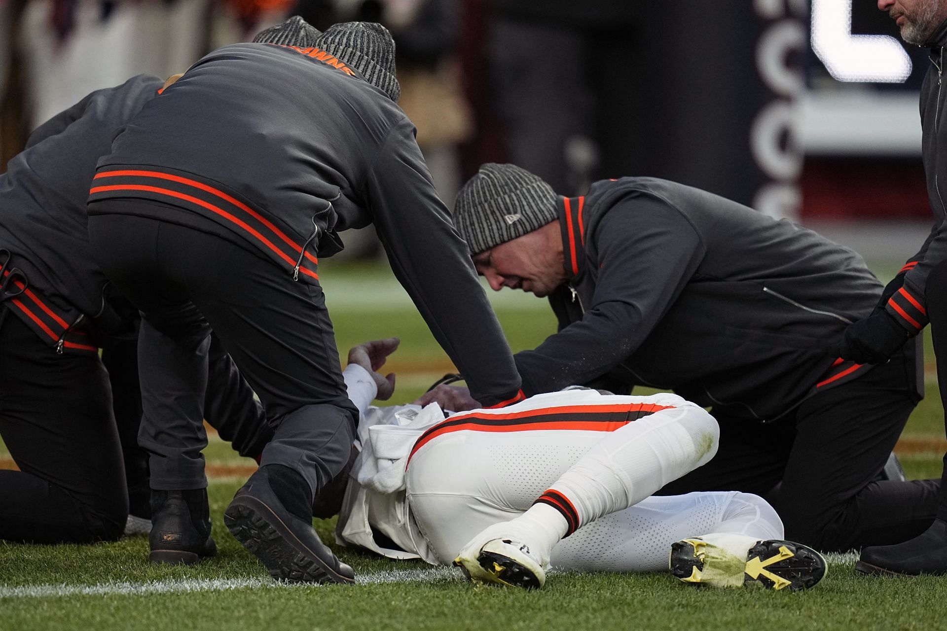 Dorian Thompson-Robinson receives medical attention after a huge hit.