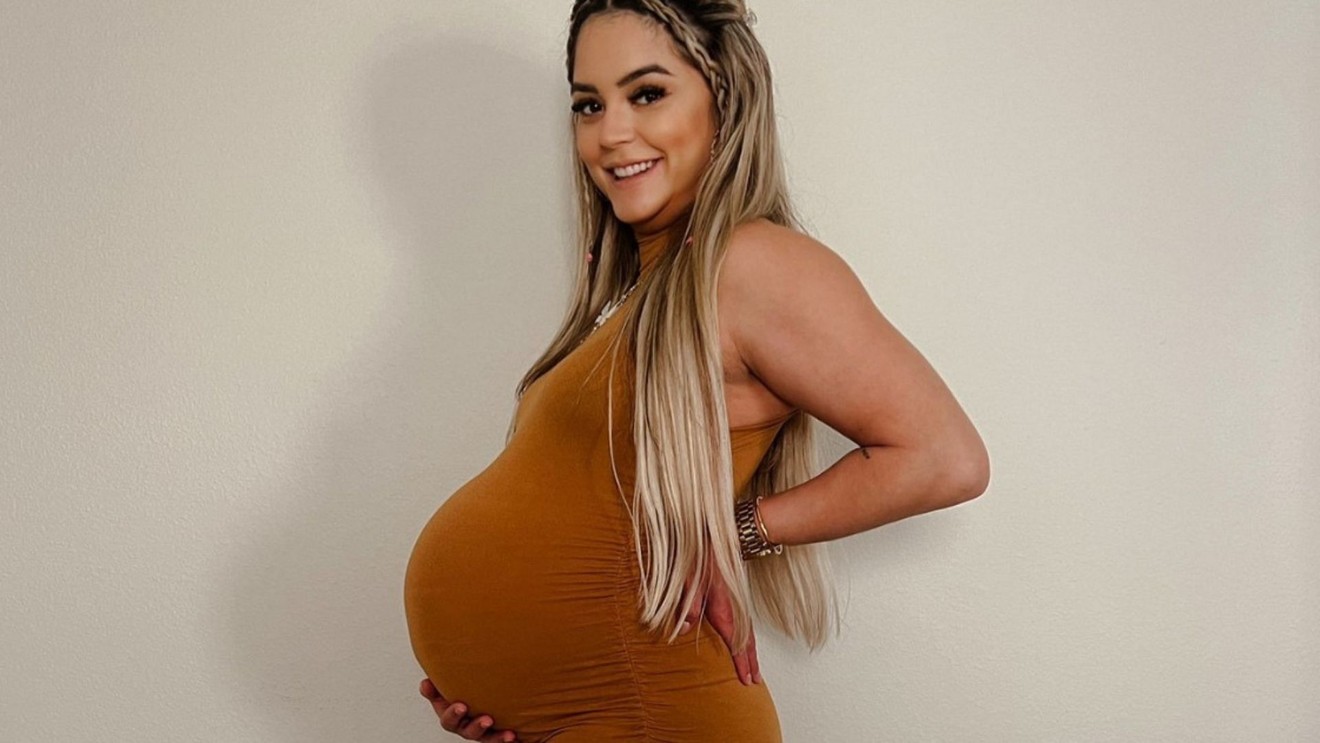 Tay Melo has shown off her baby bump