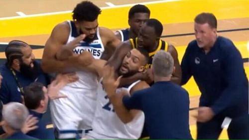 Rudy Gobert got put in a headlock by Draymond Green.