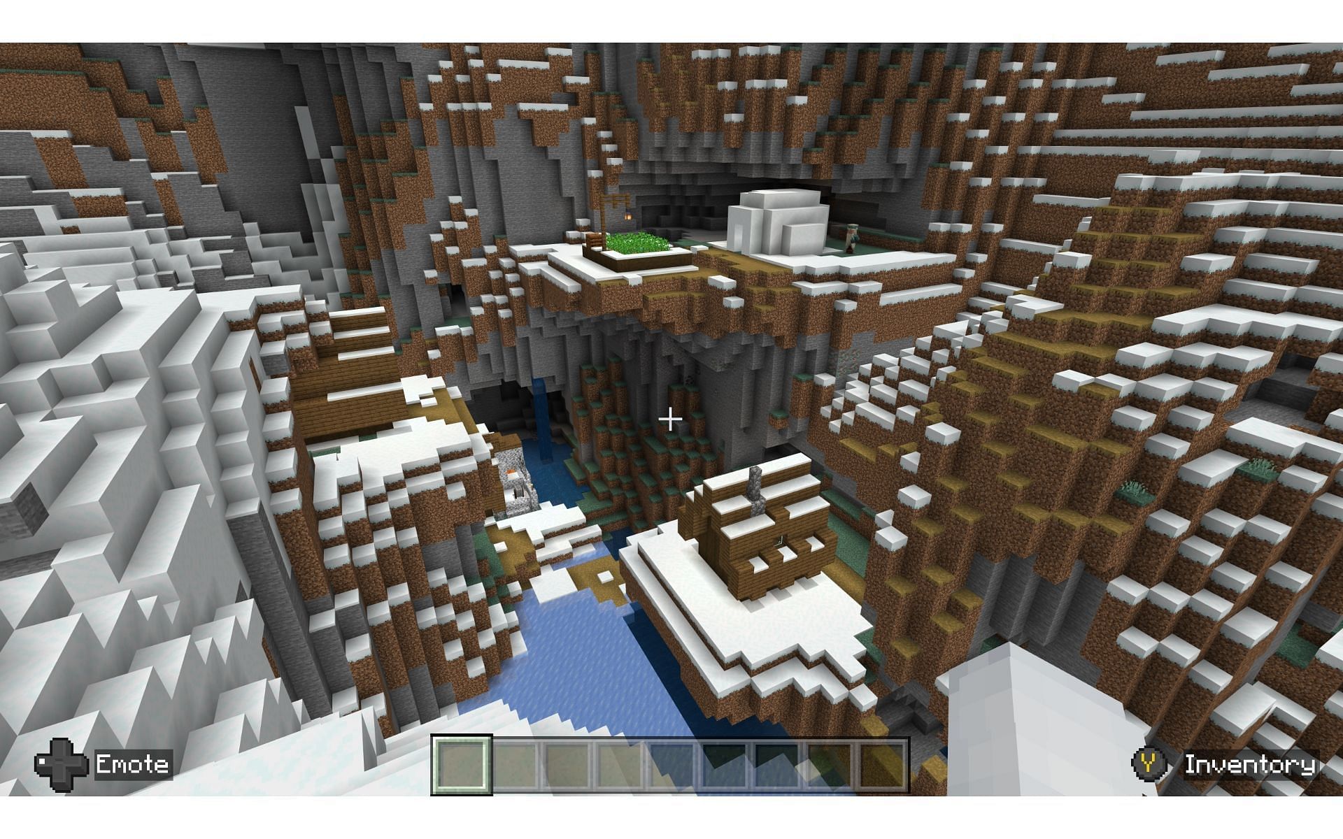 Live in this fun village inside a ravine (Image via Mojang)