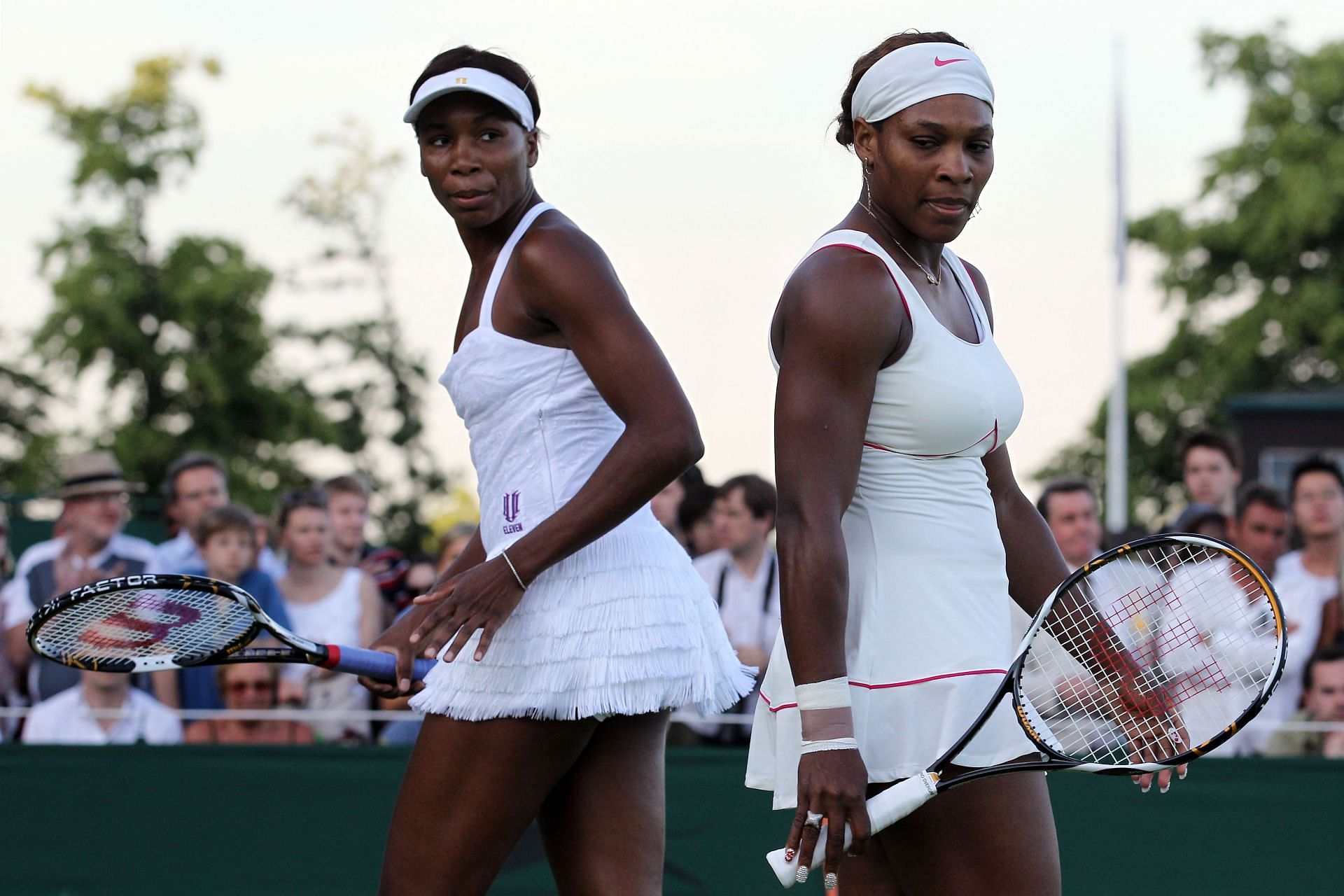 Venus Williams (L) and Serena Williams.