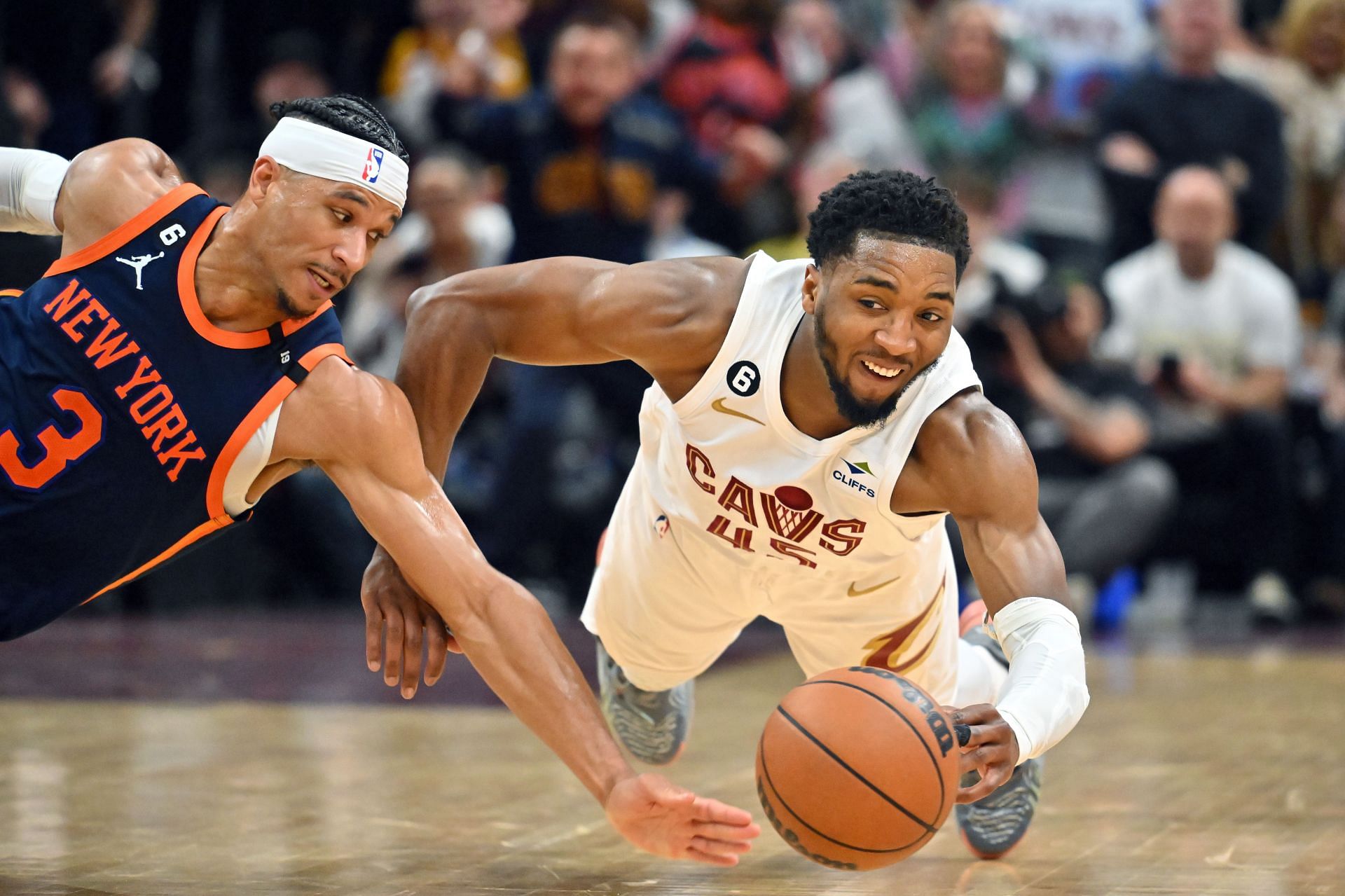 Josh Hart of the New York Knicks and Donovan Mitchell of the Cleveland Cavaliers