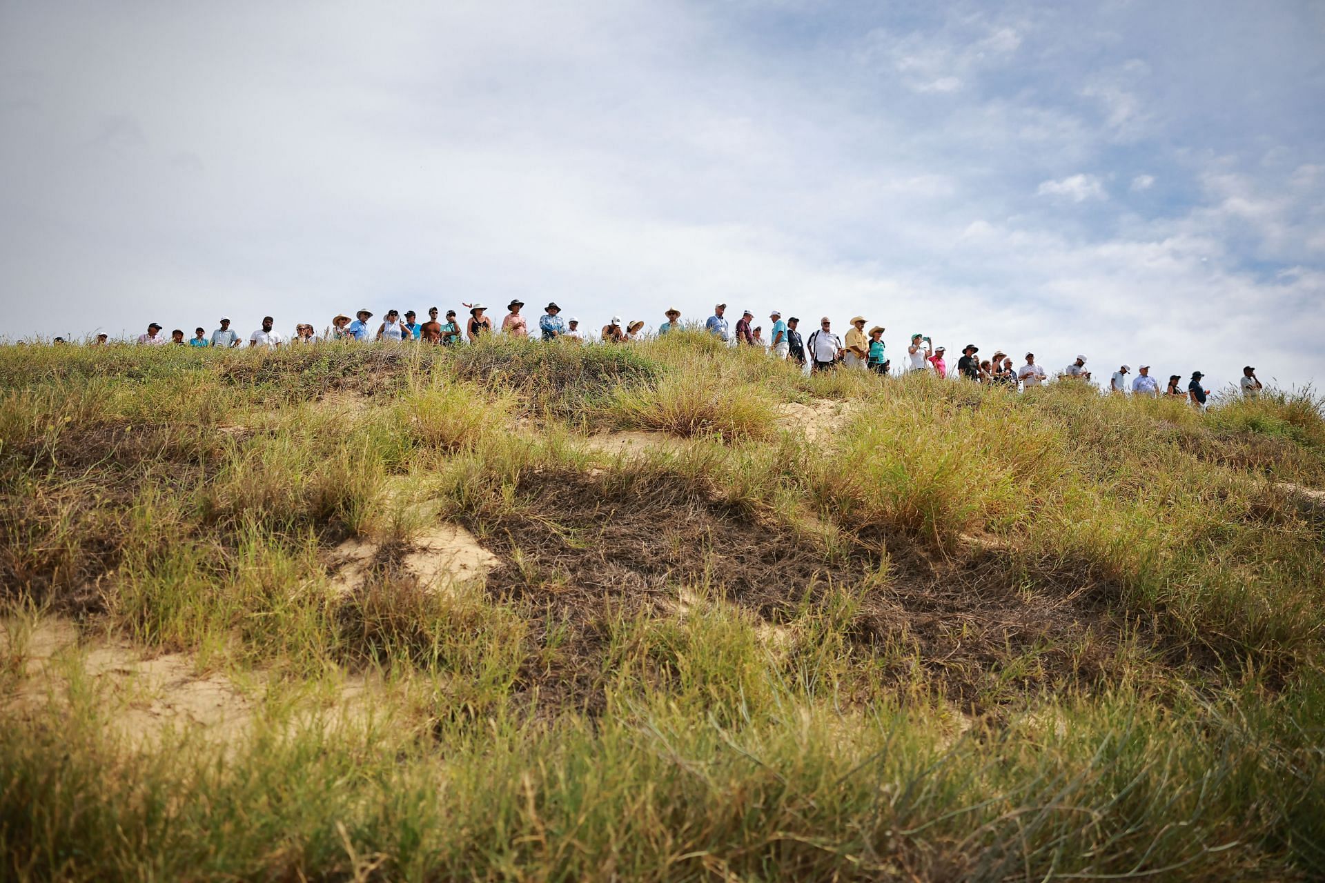 Fans watch from the first hole during the third round of the World Wide Technology Championship at El Cardonal at Diamante (Image via Getty)
