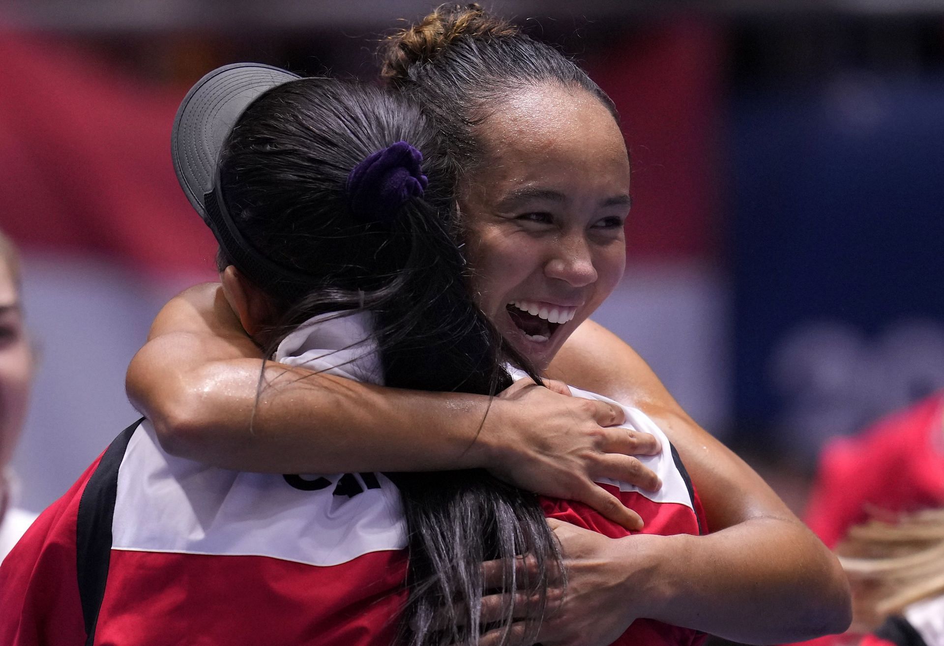 Leylah Fernandez celebrates with her teammates after winning the Billie Jean King Cup