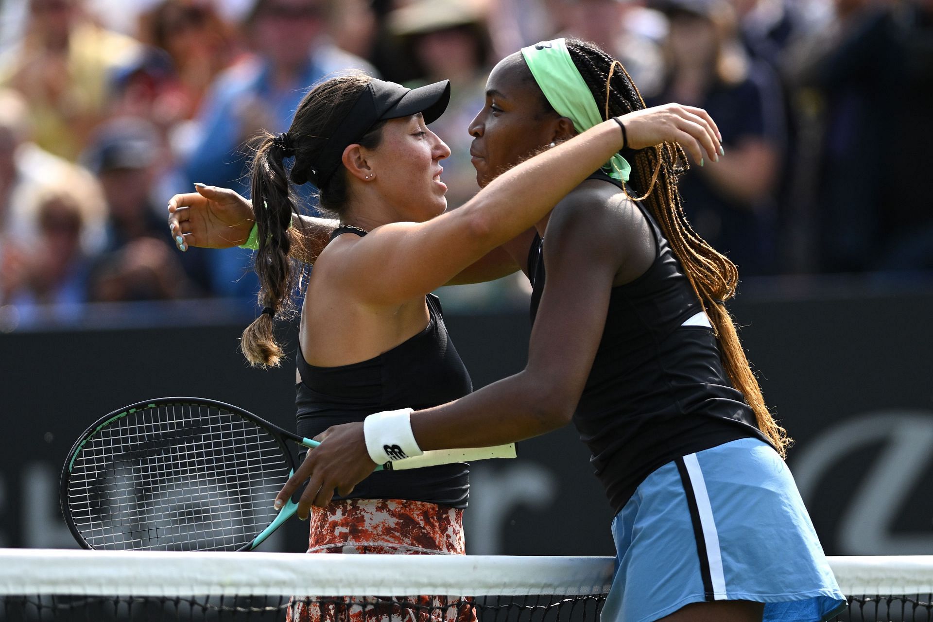 Jessica Pegula (L) and Coco Gauff greet each other.