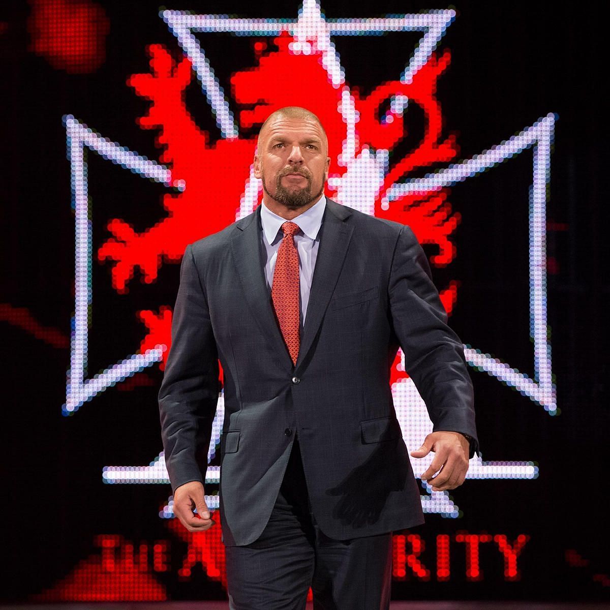 Does Triple H own any of WWE?