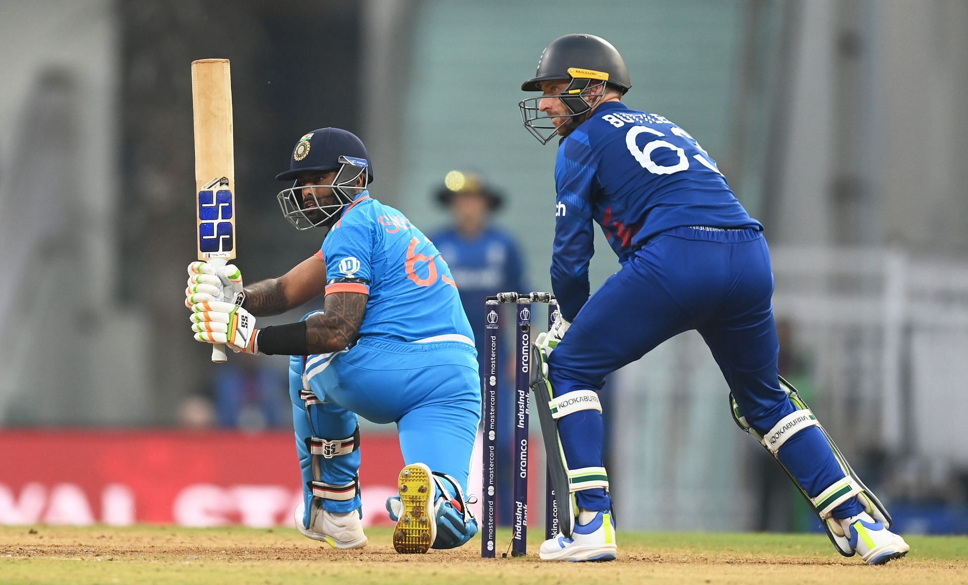 Suryakumar Yadav sweeping during the India v England - ICC World Cup 2023