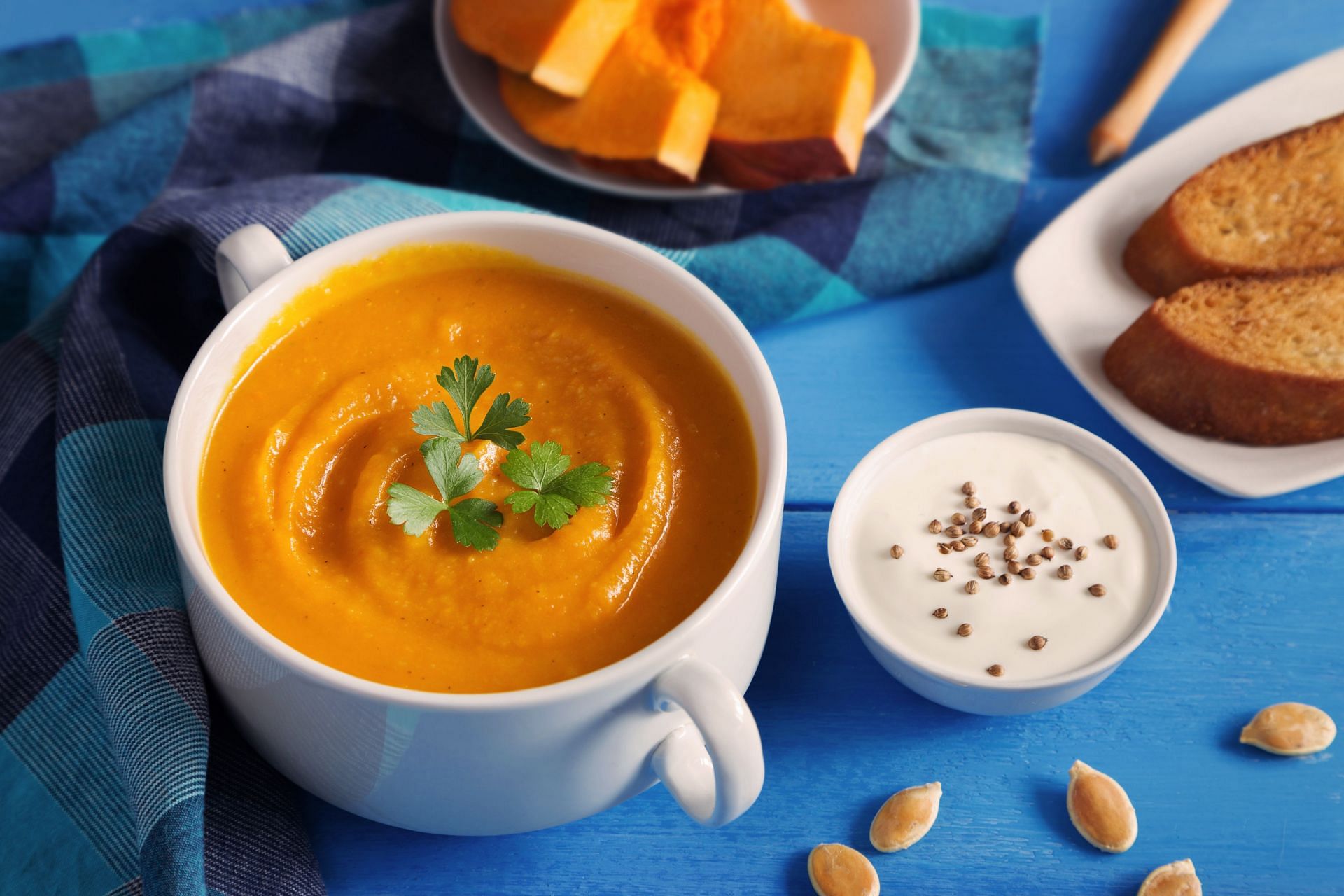 Squash soup (Image via Unsplash/ Elena Leya)