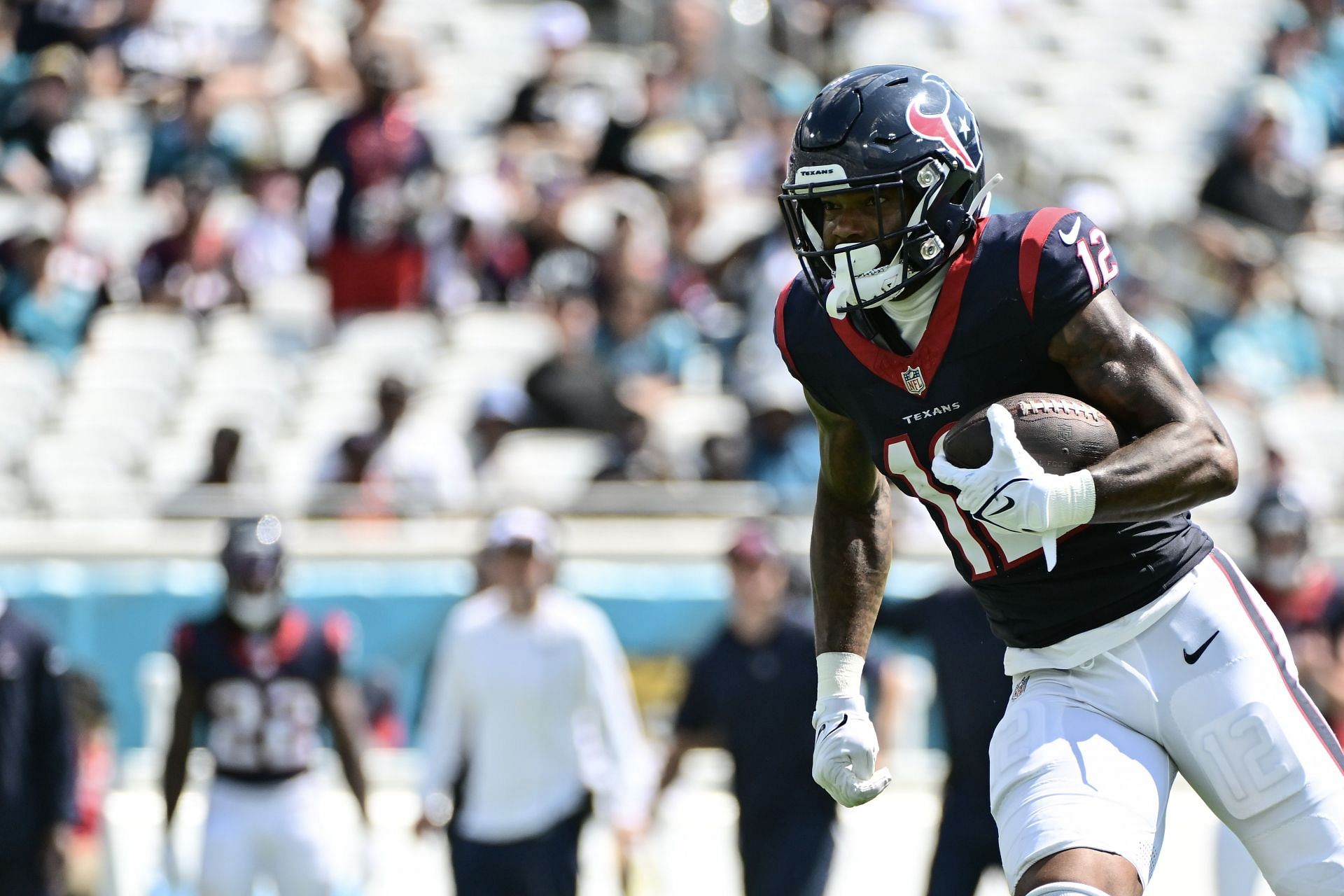 Nico Collins running the ball vs Jacksonville Jaguars