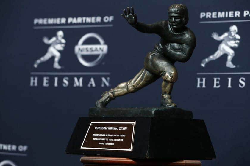 How many wide receivers have won the Heisman Trophy? Looking at the winners list of college