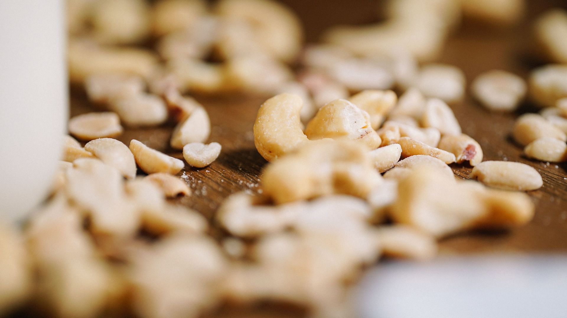 You can include peanuts as snack or in the form of butter in your diet. (Image via Unsplash/ Felipepelaquim)