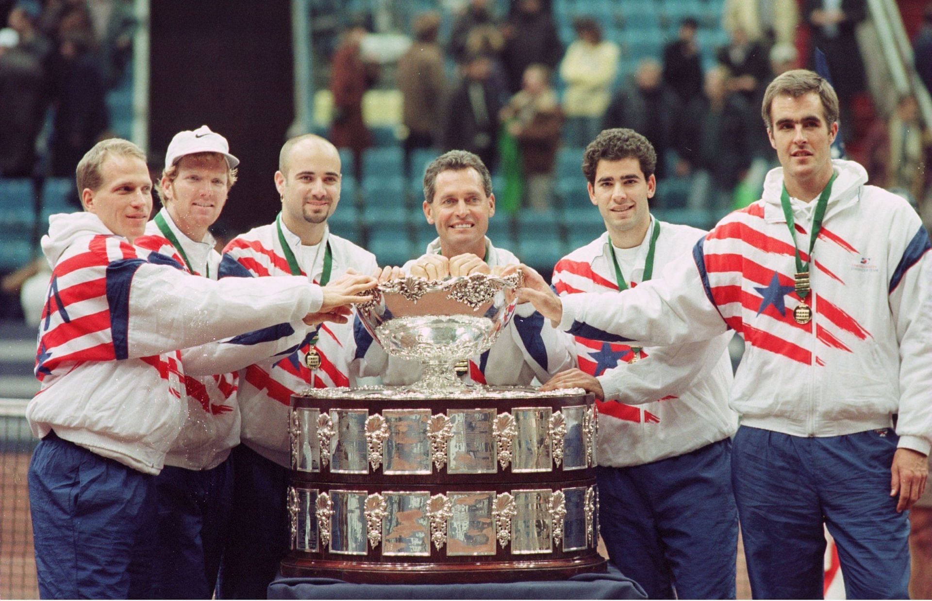 Andre Agassi celebrates with his teammates: DAVIS CUP FINAL 1995