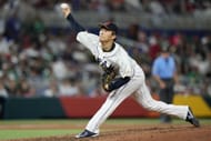 Yoshinobu Yamamoto delivers a pitch during a World Baseball Classic game