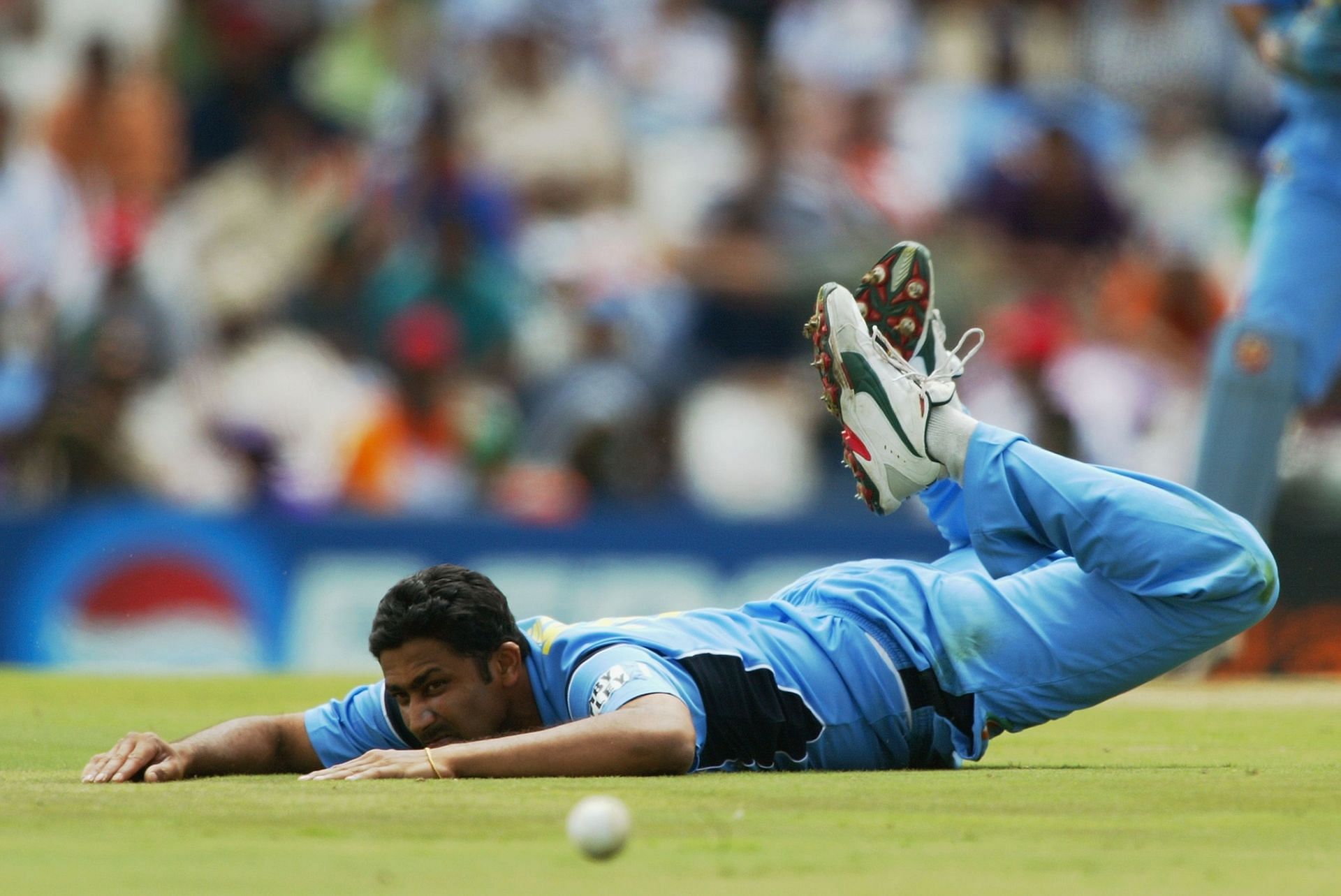 Anil Kumble of India dives but fails to stop the ball. [Getty Images]