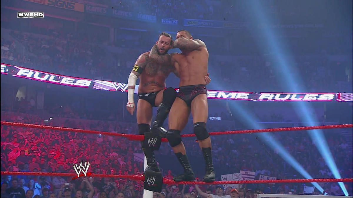 Randy Orton about to hit a top rope RKO on CM Punk