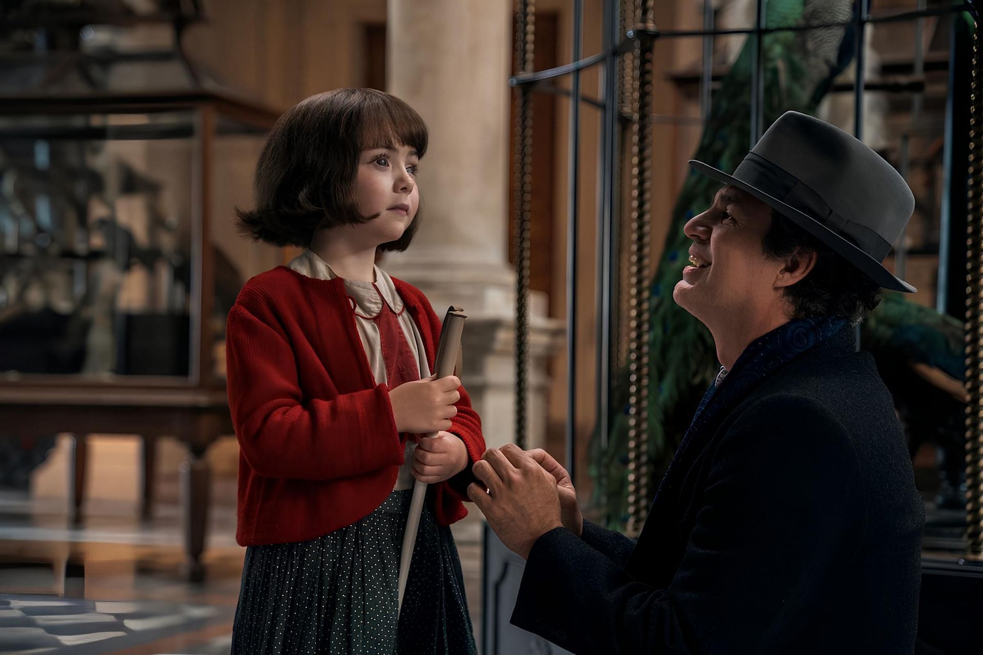 Nell Sutton as younger Marie-Laure and Mark Ruffalo as Daniel LeBlanc (Image via Netflix)