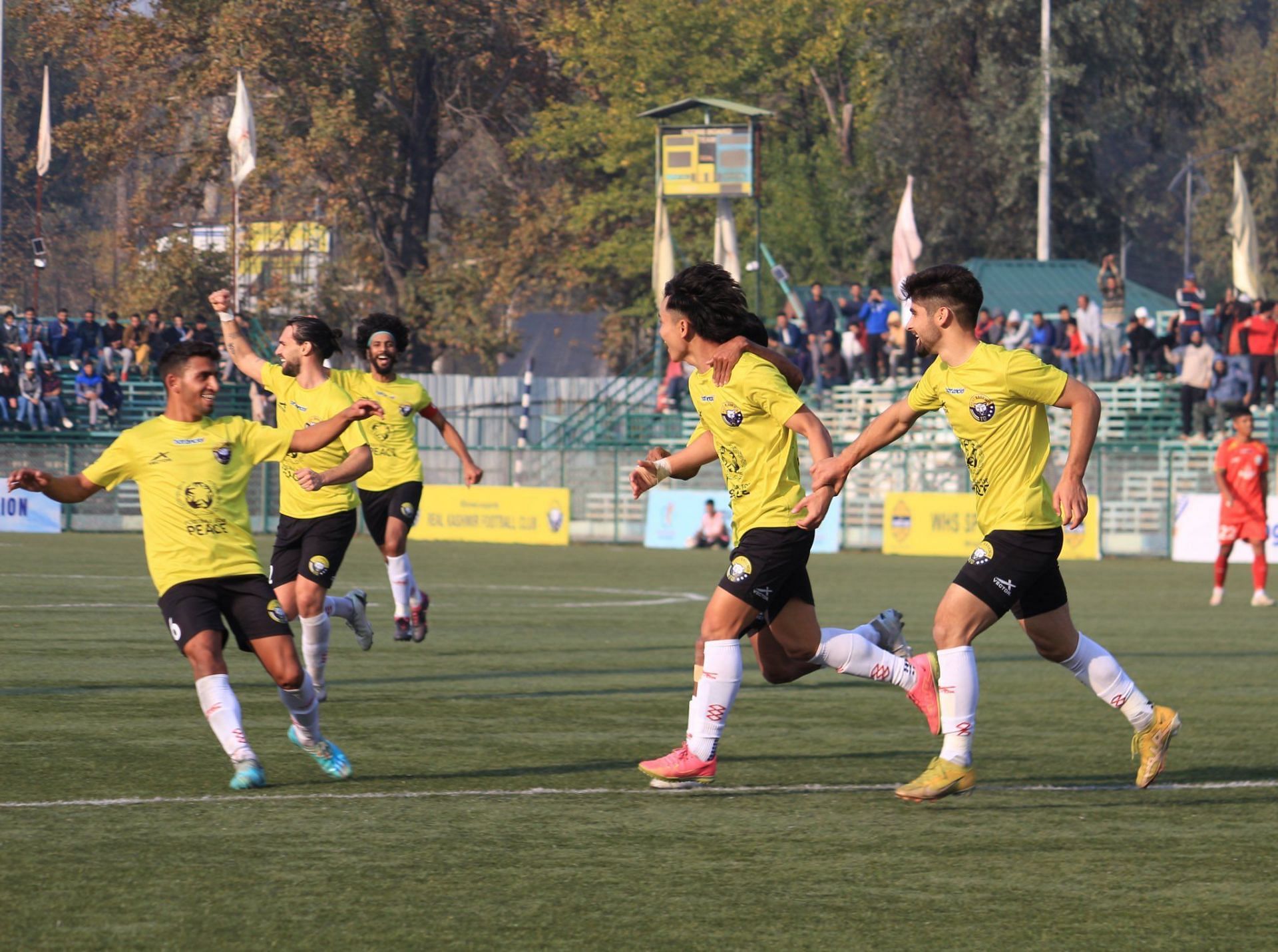 Real Kashmir players celebrating the goal against TRAU (Picture Credits: X/I-League)